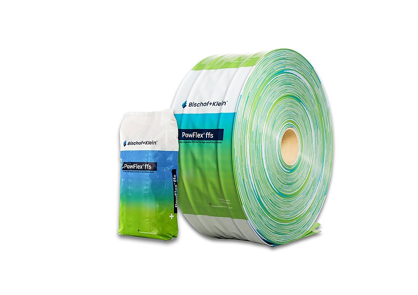 Product photo of the PowFlex® ffs, shown once on a roll and once as a pre-made bag in the green-and-blue Bischof+Klein design