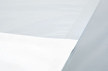 Produktfoto von sterilisierfähigen Beuteln, Lids und Sheets aus Tyvek® in vier verschiedenen Größen