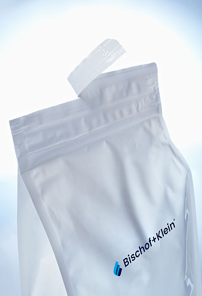 Produktfoto des U-Pack® in weiß mit Bischof+Klein Logo von oben