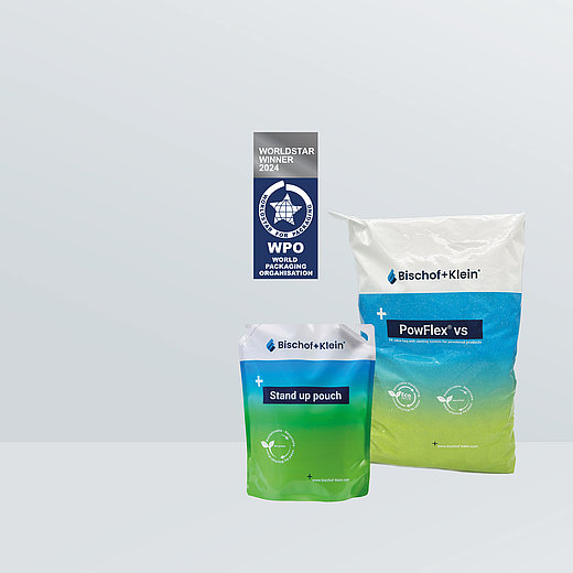 Shown here are one of the PowFlex VS pouches and a stand-up pouch in the green-and-blue Bischof+Klein design. The WorldStar Winner logo is placed above them. It reads: “WorldStar Winner 2025, World Packaging Organisation”